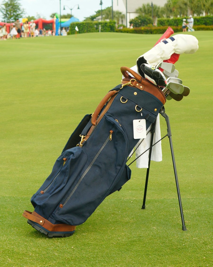 The Navy Standard Bag on a course with palms behind