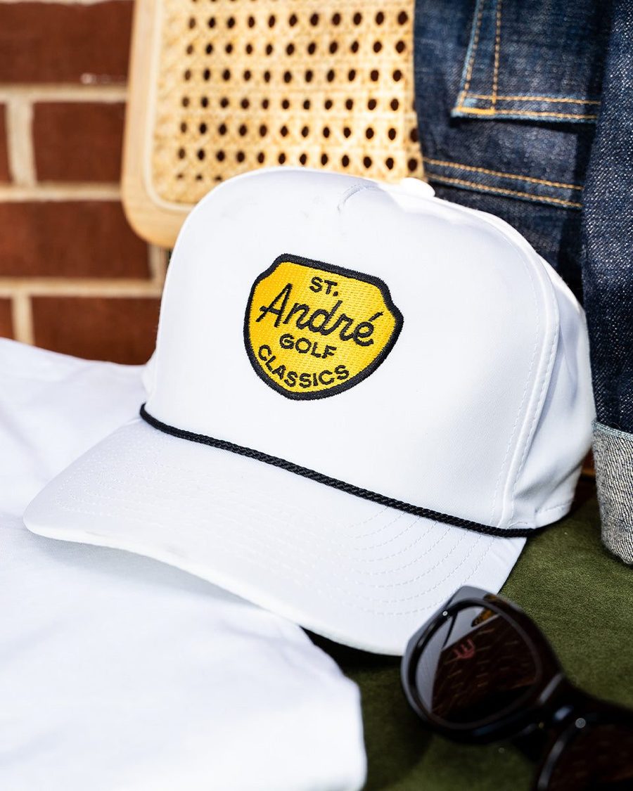 A white St. André rope hat with a yellow Classics patch