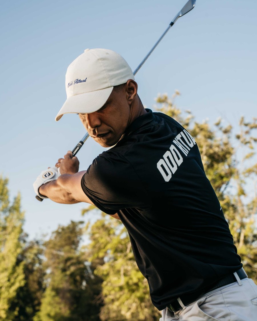 Odd Ritual: The Odd Ritual back print, mid-swing