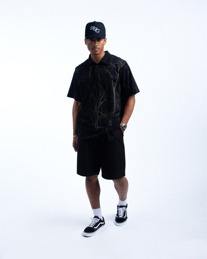 Students Golf Greenbriar S/S Polo Shirt — Black · view 1 of 4