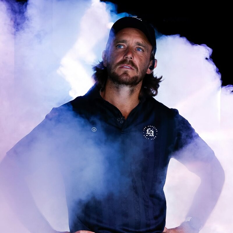 Students Golf polo in the smoke — brand editorial — @studentsgolf