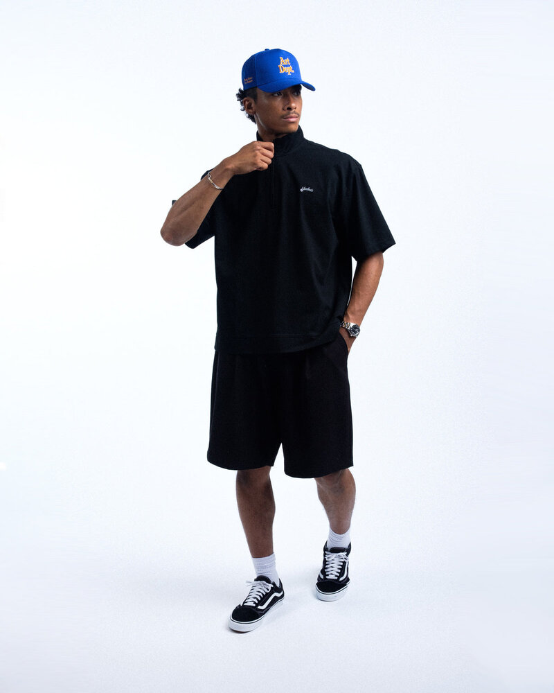 Students Golf Manager S/S Q-Zip Shirt — Black · view 1 of 4