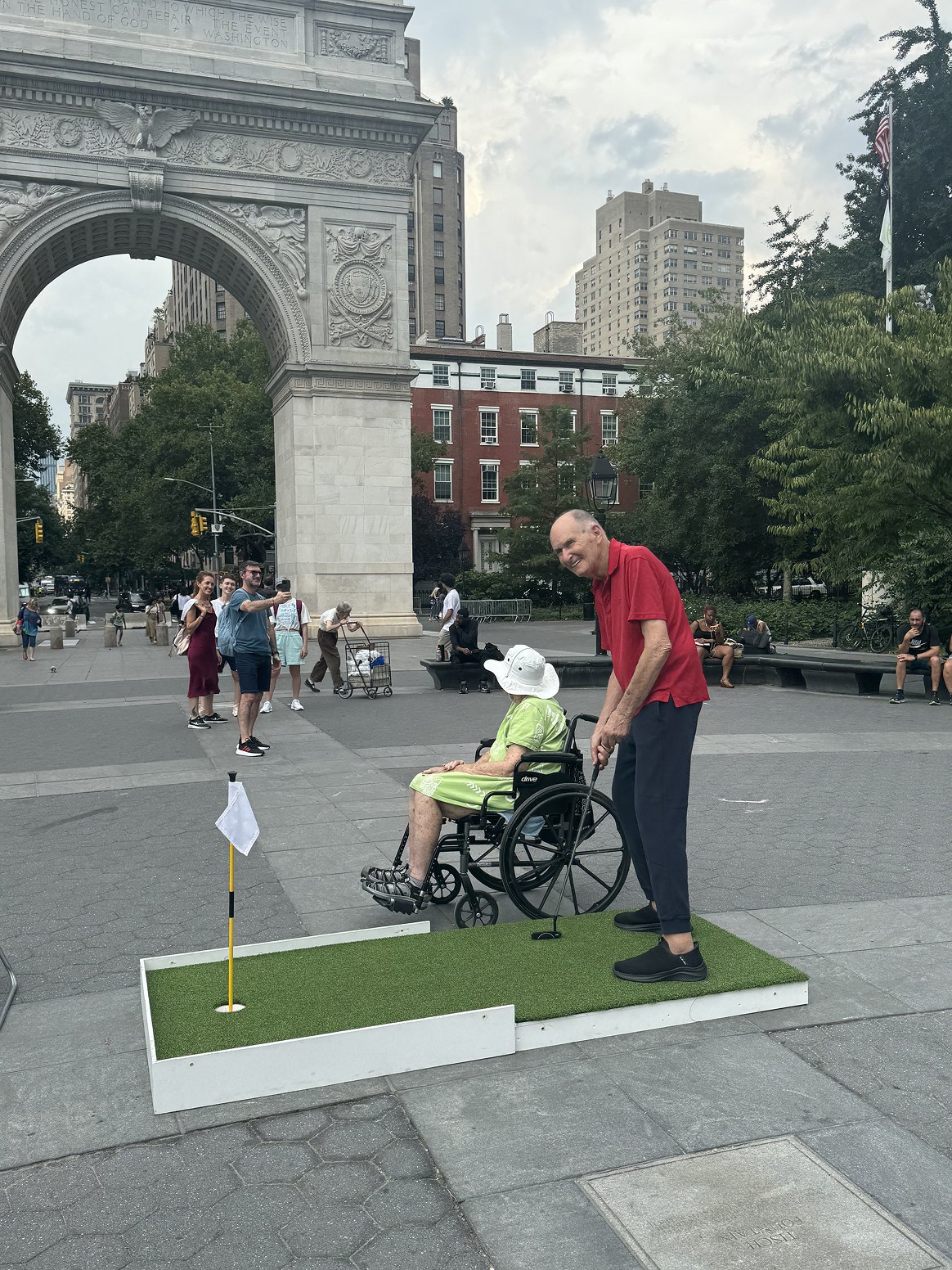 Whim's portable putting green set up in Washington Square Park, New York